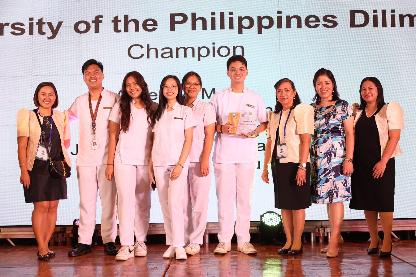 From L-R UP Diliman students Dick David T. Ongking, Joecile Faith C. Monana, Althea M. Mella, Shara Cindy N. Xu and Jose Rafael R. Palomares were hailed champions. Joining them are Ms. Kristia Lei Reyes, Board of Academe (leftmost), Ms. Eloisa Villaraza, President of NDAP (3rd from right), Ms. Ivy Sicat, Nutrition Advocacy Manager, Nestlé Philippines (2nd from right) and Ms. Elizabeth Prudenciado, Board of Academe (rightmost) 